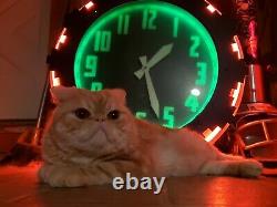 1936 Aztec Neon Clock. Art Deco, Vintage 26 inches. Cat is not included