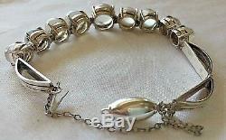 An Antique Late Victorian Art Deco Sterling Silver Cats Eye Moonstone Bracelet