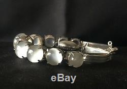 An Antique Late Victorian Art Deco Sterling Silver Cats Eye Moonstone Bracelet