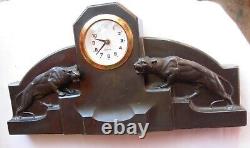 Antique Black imitation stone mantel clock with big cats jaguars panthers