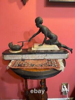 Art Deco Sculpture of Child Playing With Cat