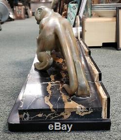 Circa 1930 French Art Deco Metal Panther Sculpture on Marble Base by Guy Debe