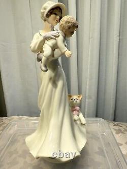 Marianne's Vintage porcelain figurine of a lady with a baby and cat B8