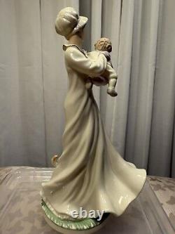 Marianne's Vintage porcelain figurine of a lady with a baby and cat B8