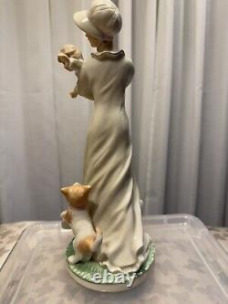 Marianne's Vintage porcelain figurine of a lady with a baby and cat B8