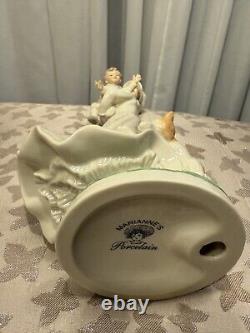 Marianne's Vintage porcelain figurine of a lady with a baby and cat B8