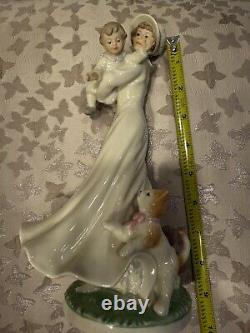 Marianne's Vintage porcelain figurine of a lady with a baby and cat B8