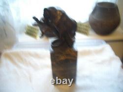 Vintage bronze of a big cat biting at a thorn in leg signed on marble base