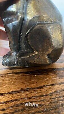 Serre-livres cubistes en forme de chat. Signé CMW 1929. Finition bronze antique.