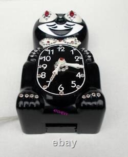 Translate this title in French: VINTAGE 60's BLACK-ELECTRIC-KIT CAT KLOCK-KAT CLOCK-ORIGINAL MOTOR REBUILT+ BOX

VINTAGE Horloge KIT CAT KLOCK-KAT noire des années 60 avec moteur d'origine reconstruit + boîte.
